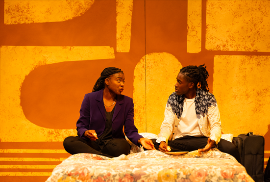 Two graduate student actors in a play