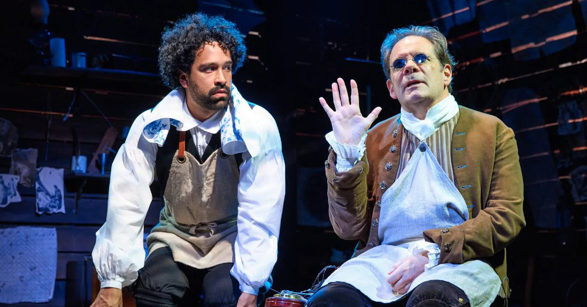 Two actors on stage in play about Ben Franklin